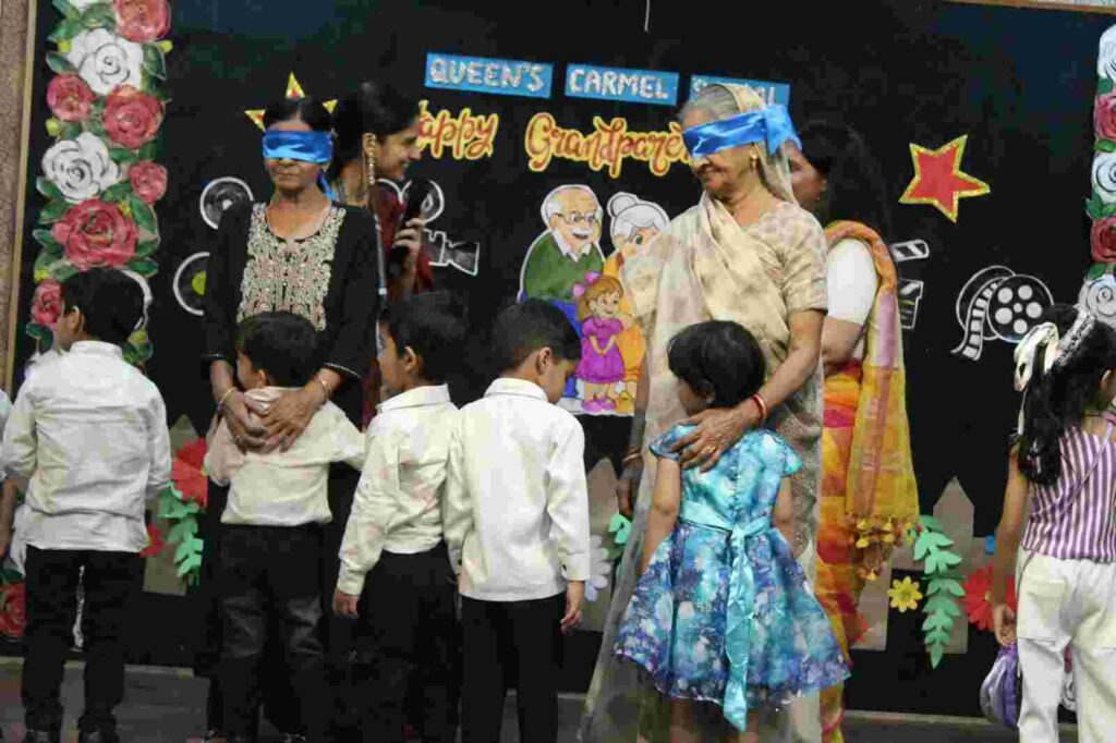 Grandparents share life memories with children on Grandparents Day at Queens Carmel School